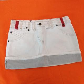Pinko minigonna cortissima in jeans colore bianco.